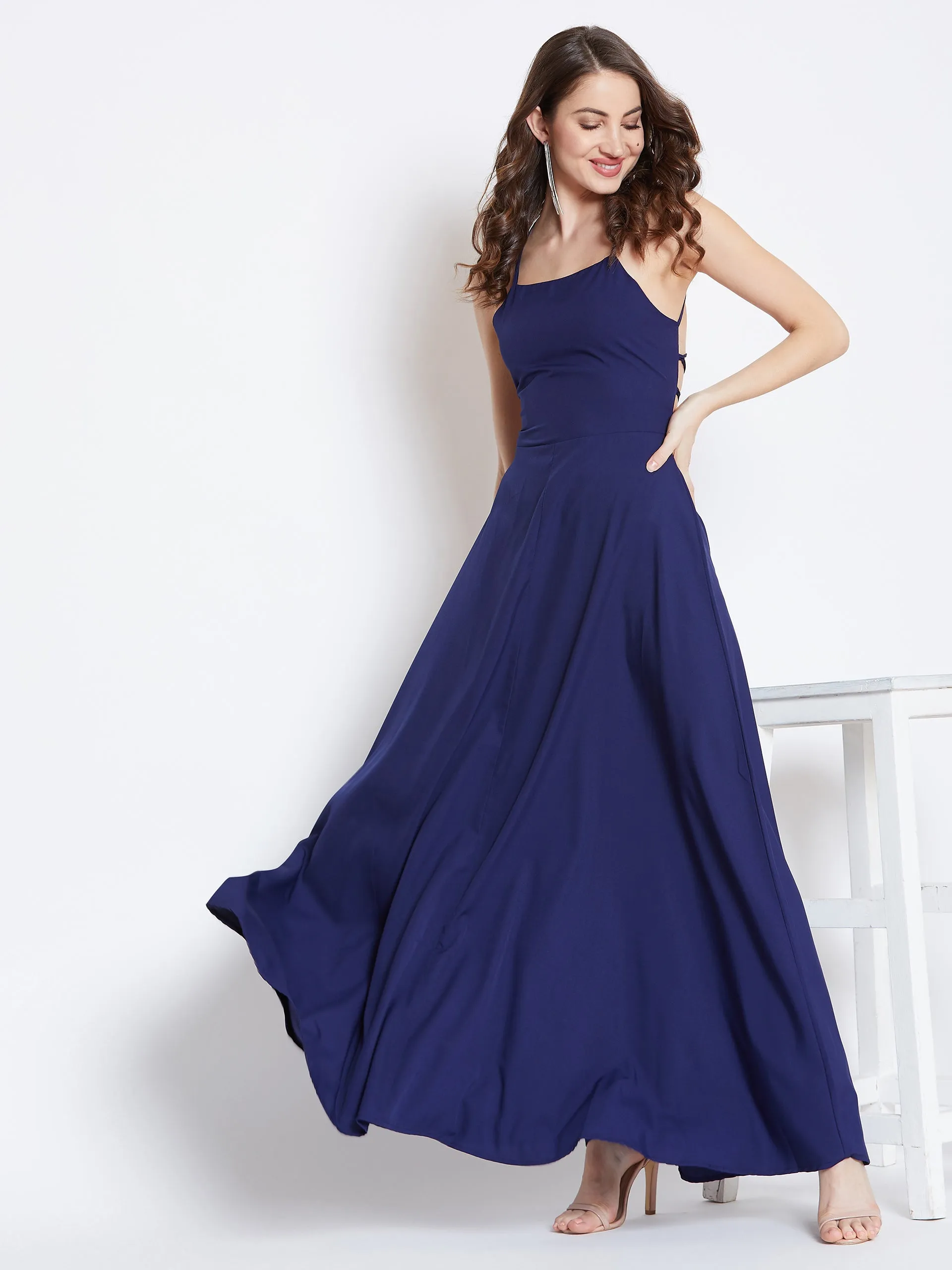 Berrylush Women Solid Navy Blue Halter Neck Caged Back Flared Maxi Dress