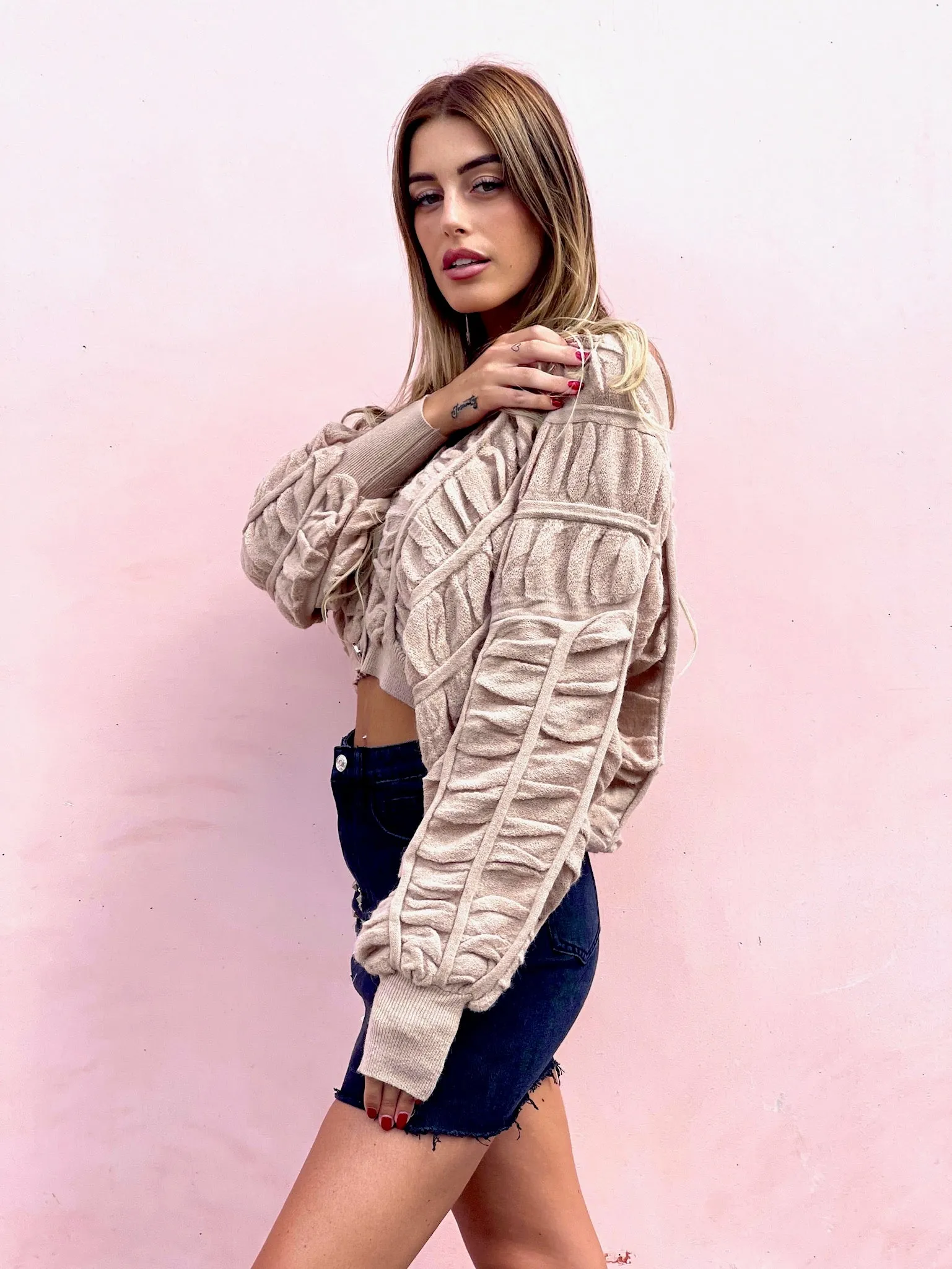 Cardigan panna a trecce