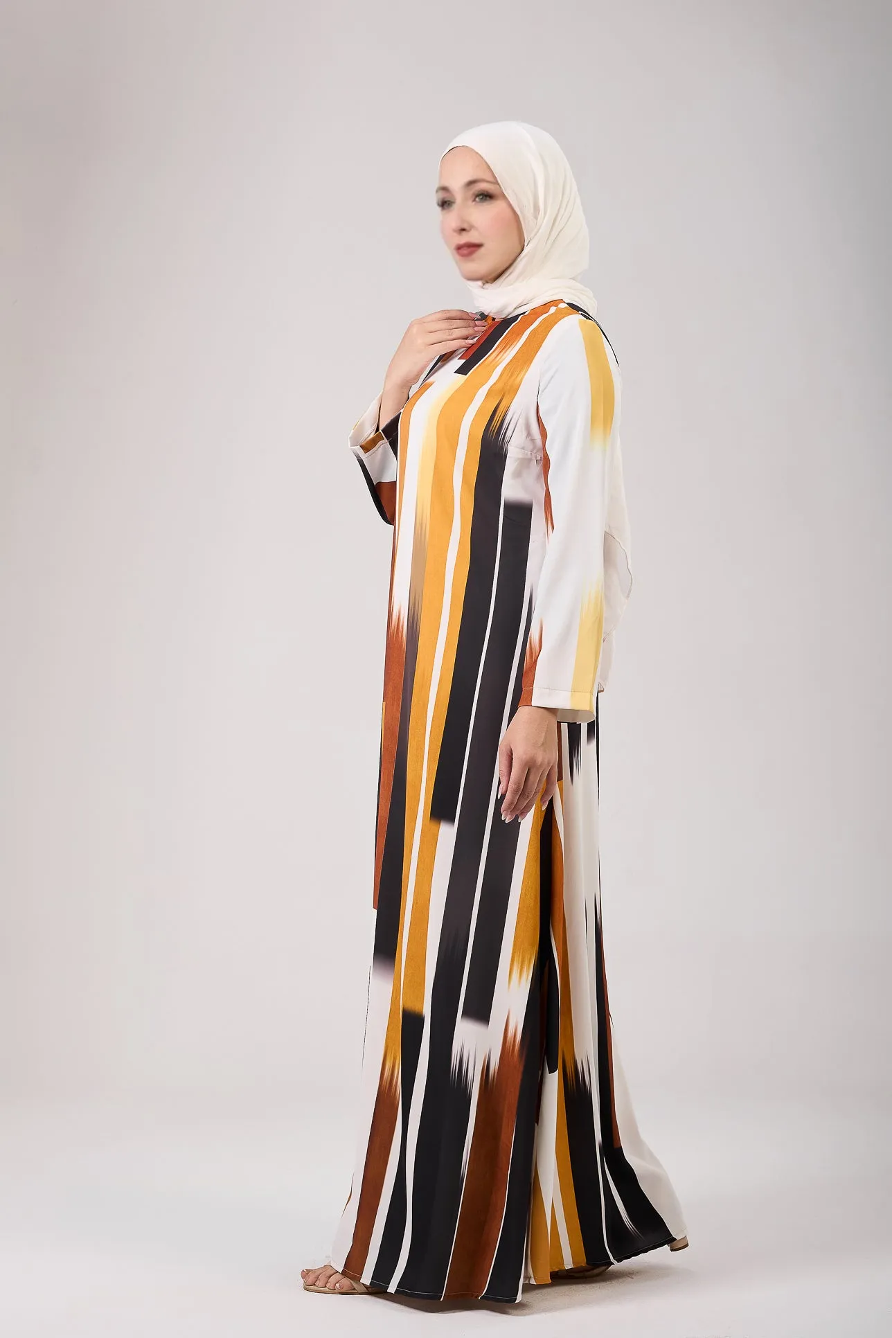 Feryal Timeless Elegance Satin Maxi Dress with Linear Patterns